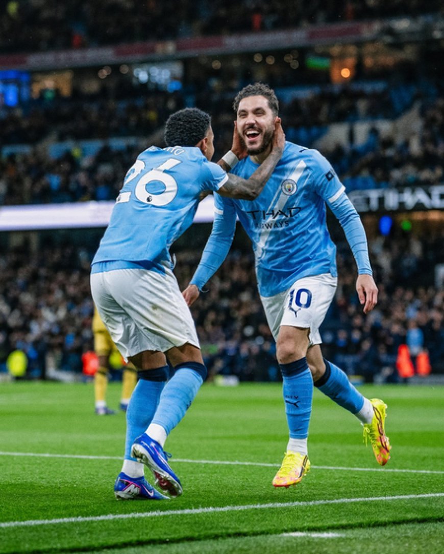 Man City cut Arsenal's lead to two points with win over Palace
