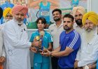 Punjab FM honours Sehnoor Bawa, a girl from Sangrur district who won gold medal in relay race at the Under-20 Asian Athletics Championship 
