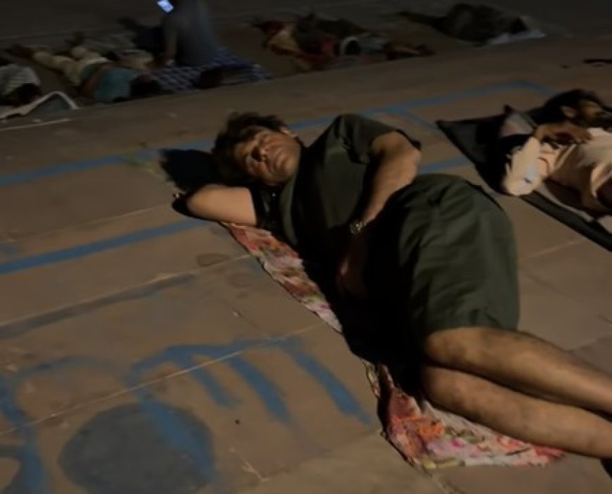 Sunil Grover sleeps on the road near a riverbank amidst many devotees