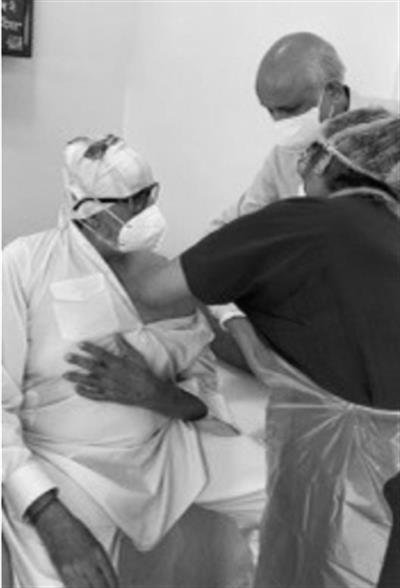 Big B gets Covid vax, says 'all family done except Abhishek'