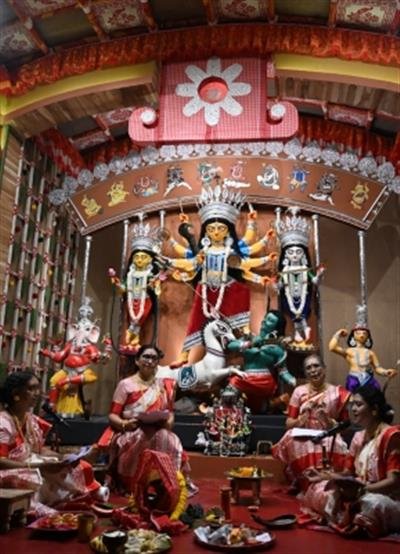 Covid infection rate comes down despite crowd gathering in pujas