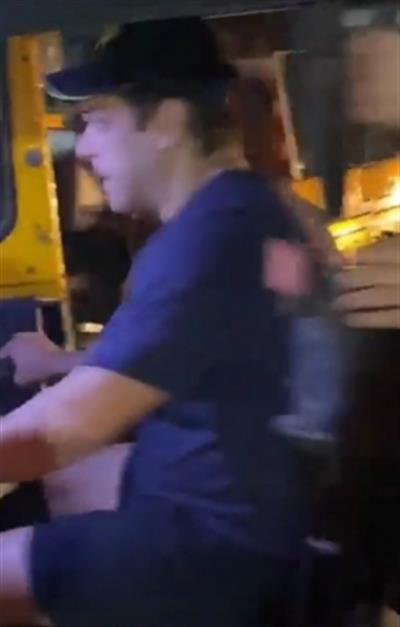 Salman Khan drives an auto-rickshaw on a busy street
