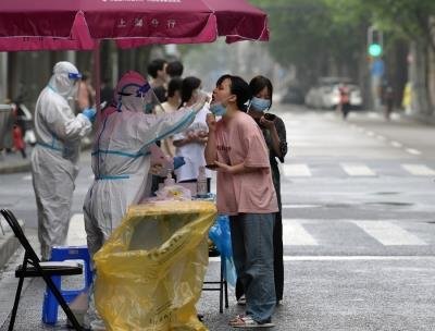 Chinese mainland reports 353 new local confirmed Covid-19 cases, 260 in Shanghai