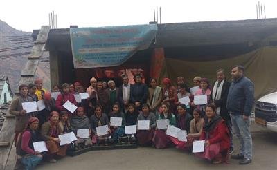 RCED distributes certificates and machines to 30 women
