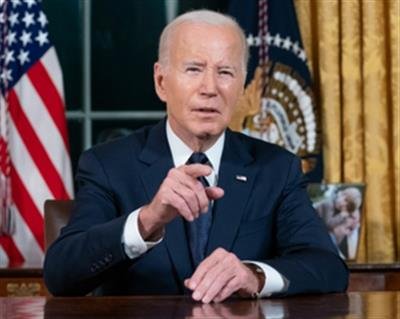 Biden says strikes on Yemen's capital in retaliation to Houthi attacks in Red Sea