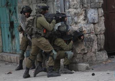 Israel detains 22 Palestinians in West Bank, including prisoners released in 'swap deal'