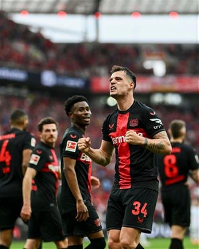 Leverkusen romps past Bremen to clinch first Bundesliga title