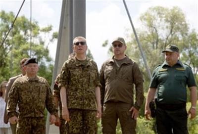 Latvia's President Rinkevics visits border with Russia