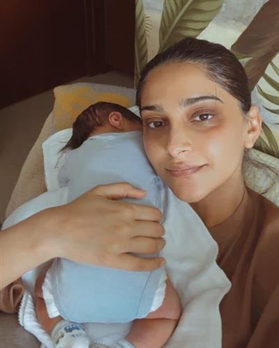Sonam Kapoor flaunts her dark circles as she lovingly holds her newborn son
